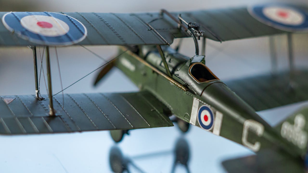 Close-up of a detailed scale model of the Royal Aircraft Factory S.E.5 fighter plane.